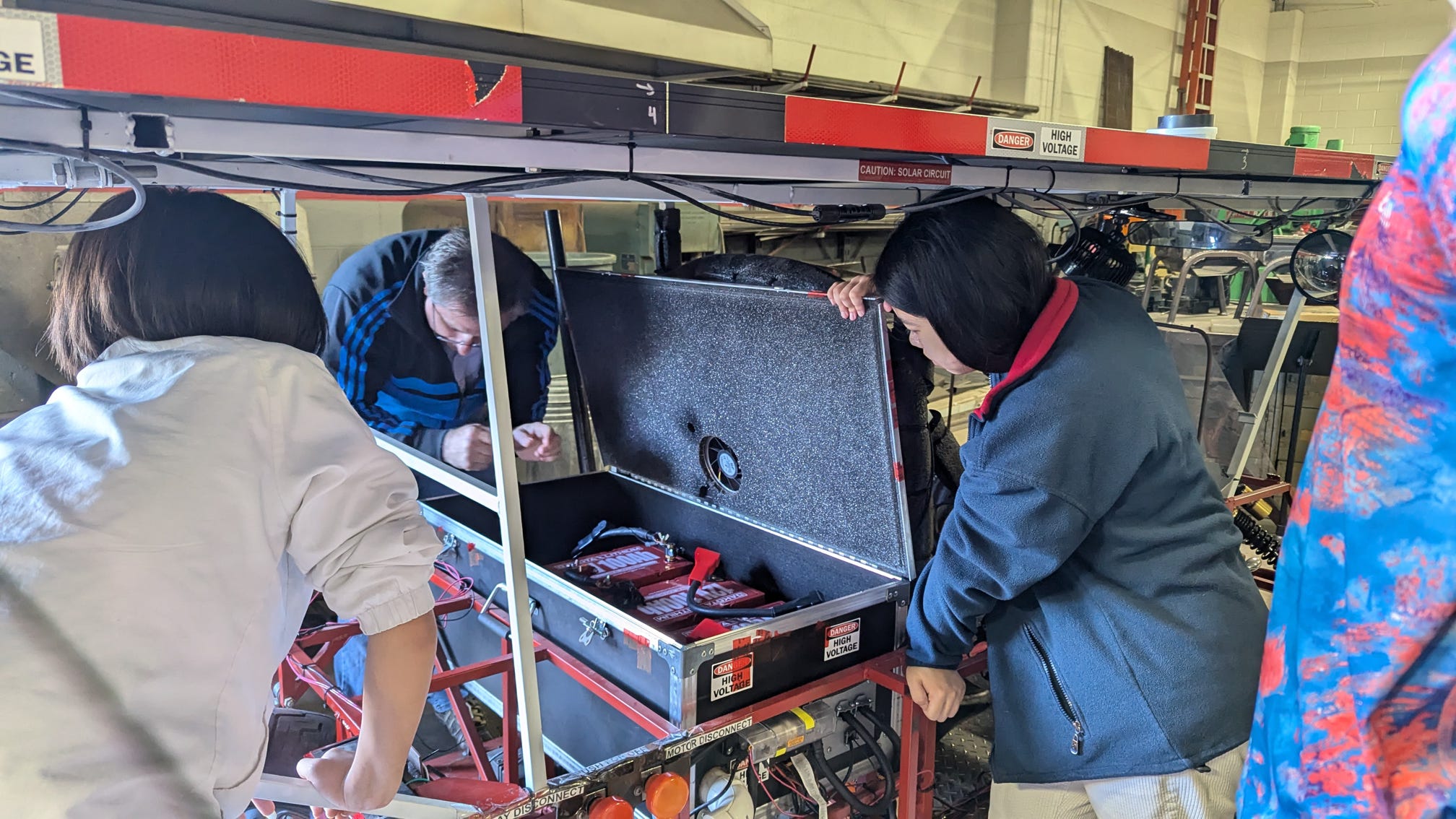 Working on the Solar Car battery box under the array
